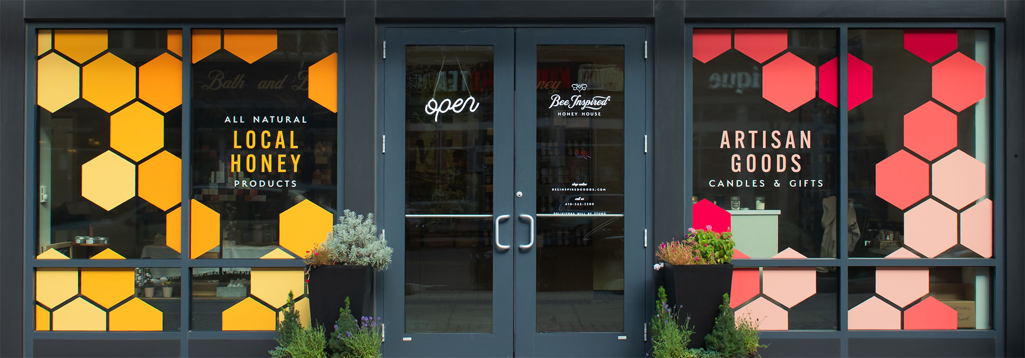 outdoor entrance of Bee Inspired retail store in Owings Mills 