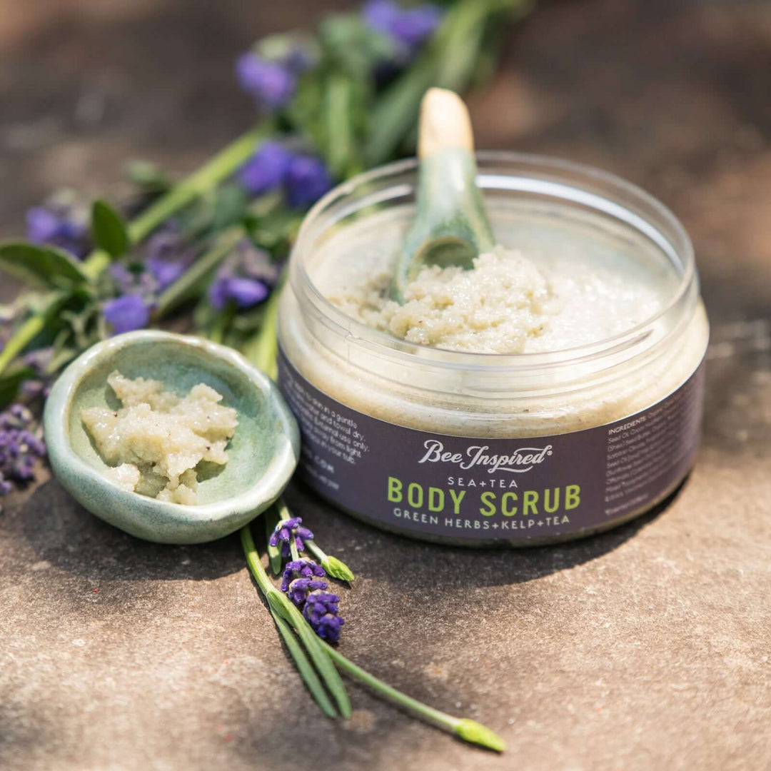 sea+tea scrub from bee inspired honey retail store in owings mills next to lavender and a small bowl