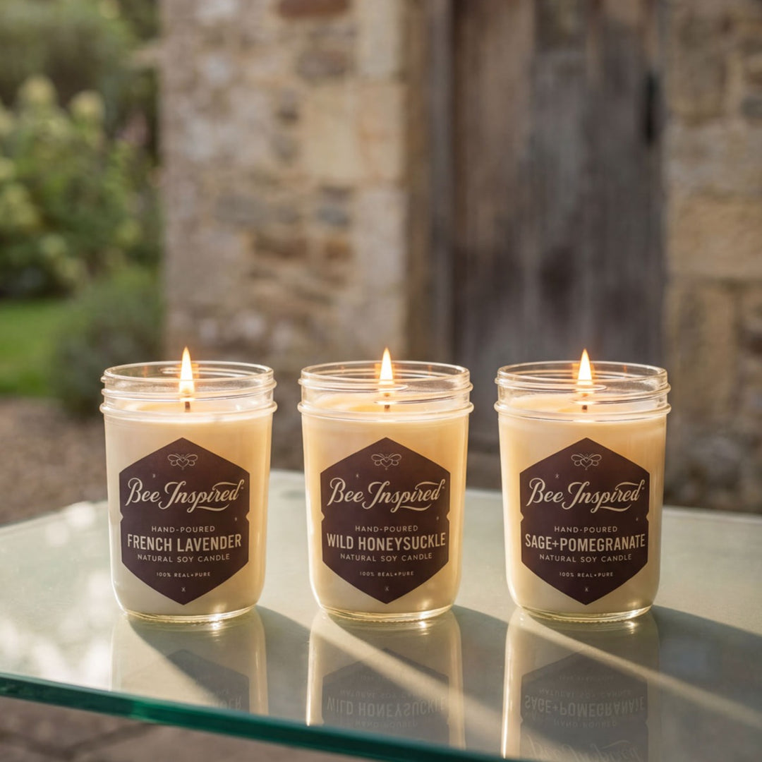 Three lit candles with &