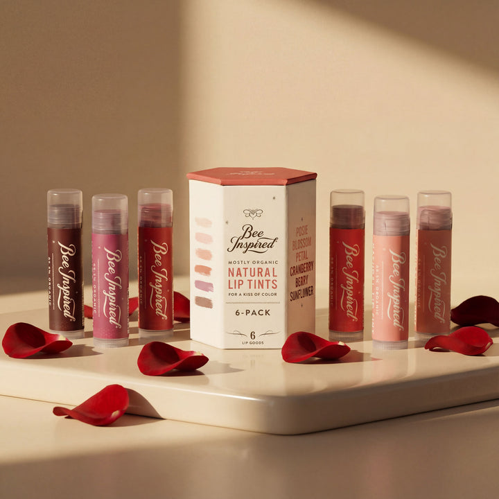 Set of lip tint containers with a box labeled &