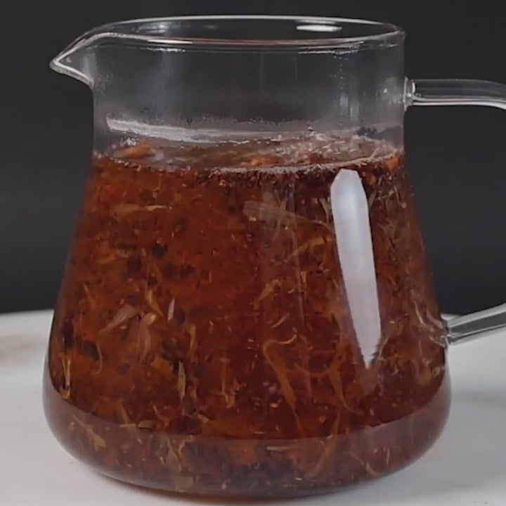 Demonstration on how to make Cider + Spice Tea with Cranberry Honey