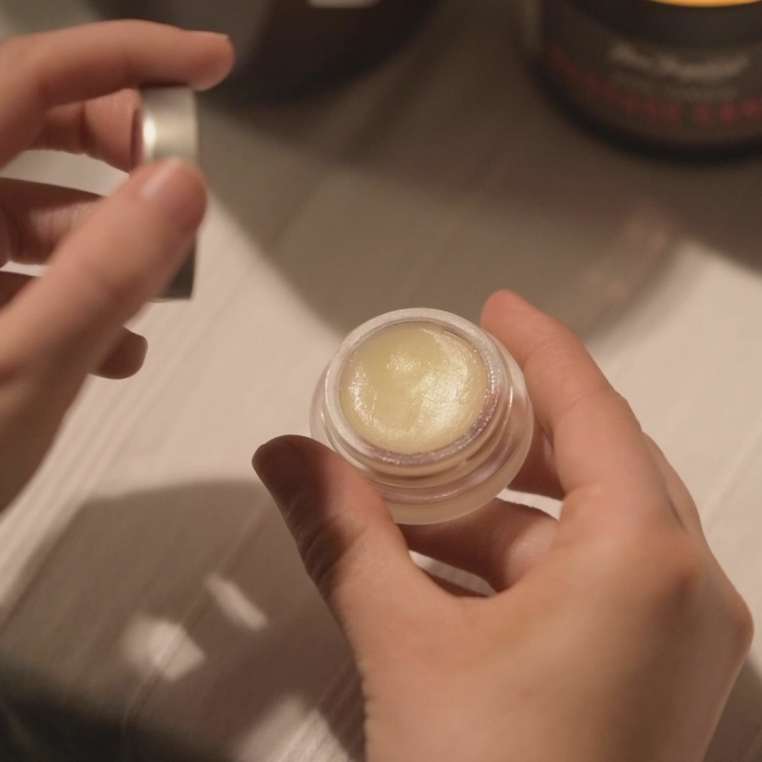 A short video of someone applying Bee Inspired lip gloss to their lips 