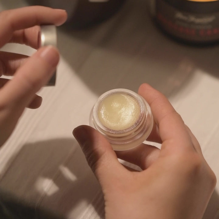 A short video of someone applying Bee Inspired lip gloss to their lips 