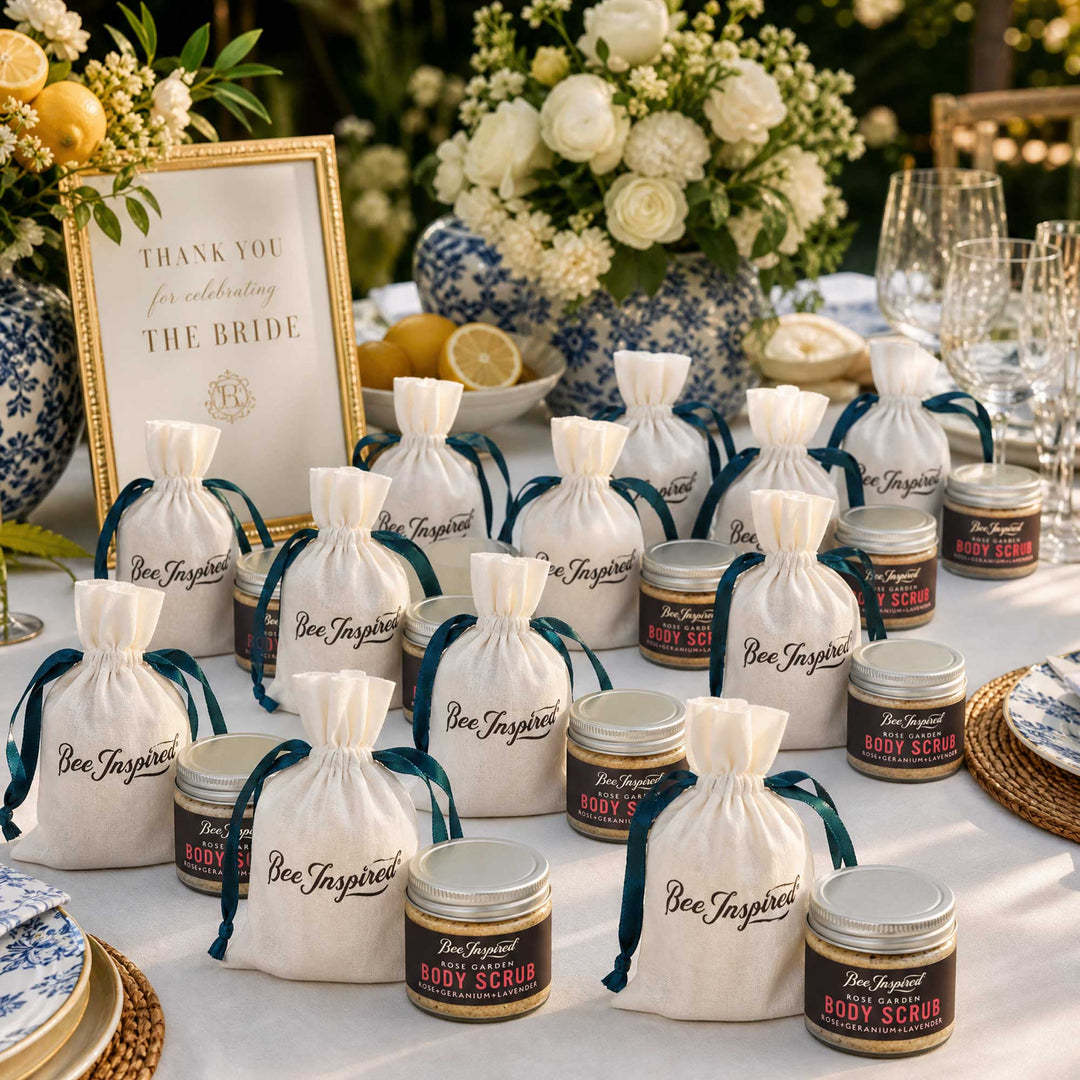 rose garden body scrub party favor on table at outside wedding